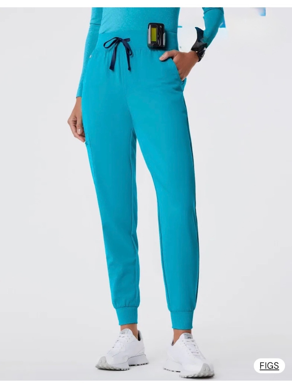 The FIONx High Waisted Zamora™  jogger scrub pants in Teal.